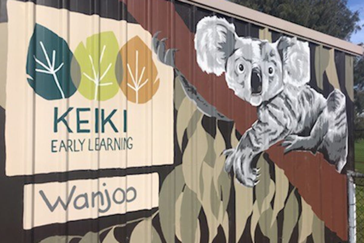 Keiki Early Learning logo, koala and Wanjoo wording painted on side of building